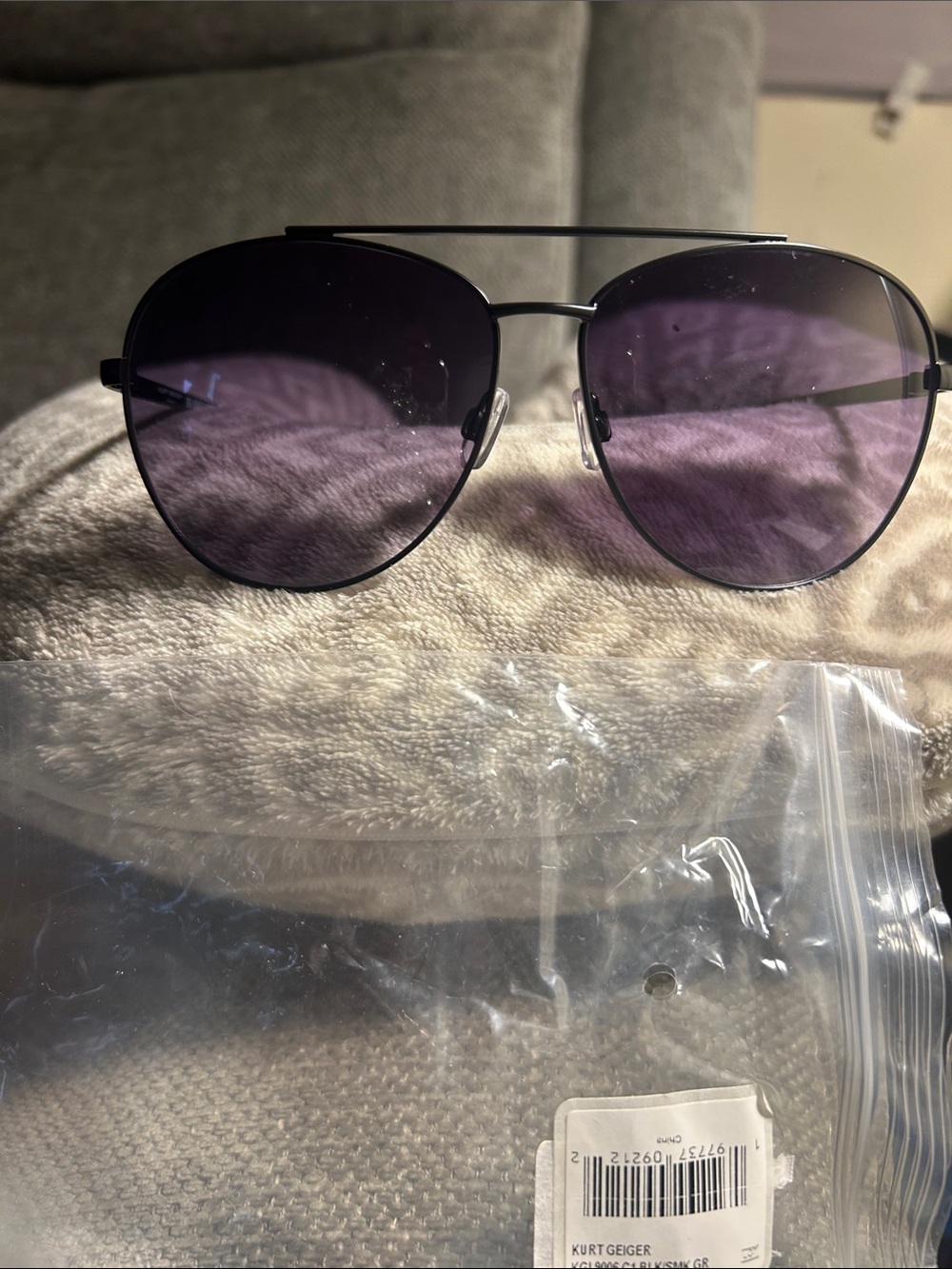 Kurt Geiger Black Frame Sunglasses with Purple Lenses